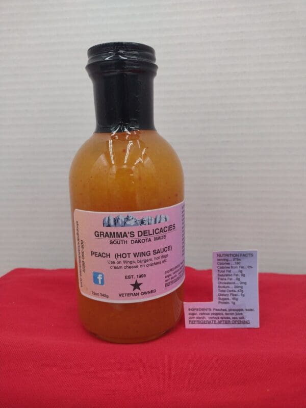 Bottle of Gramma's Delicacies Peach Hot Wing Sauce